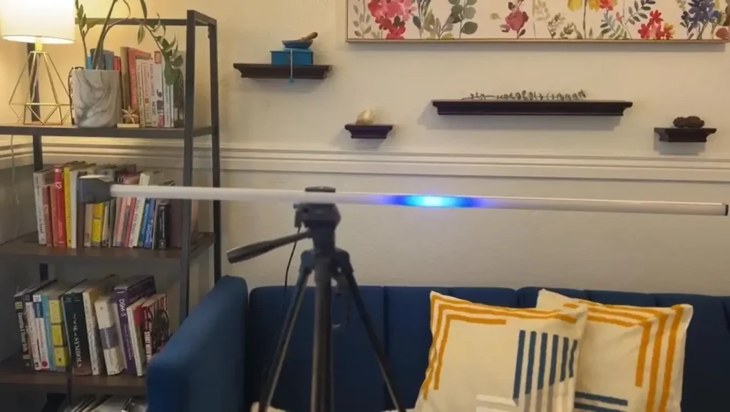 An EMDR light bar set up on a tripod in our comfortable therapy office.