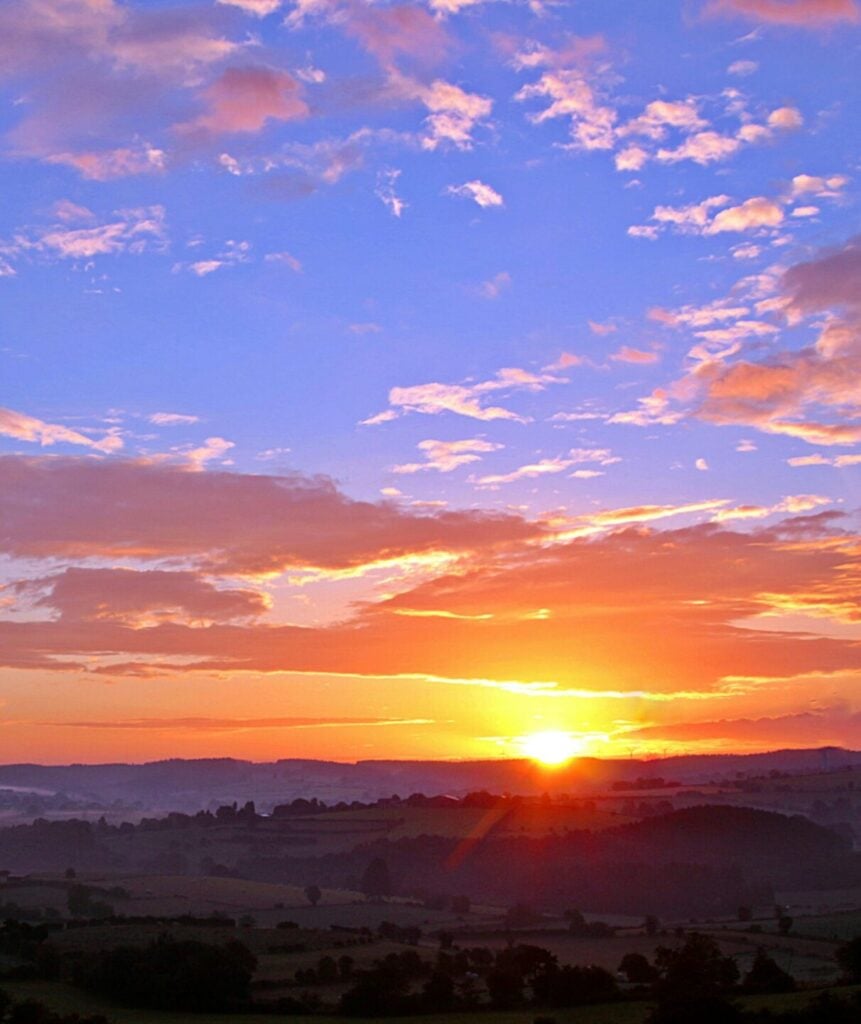 Sunrise over the Colorado Rockies, symbolizing hope, renewal, and the healing journey that therapy can bring