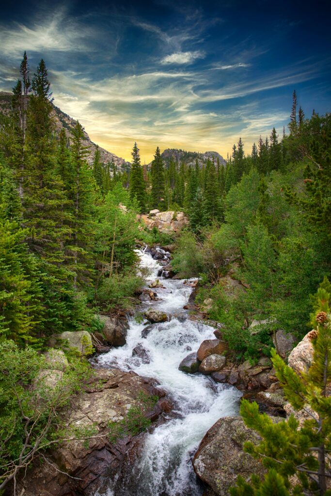 Beautiful scenic view of mountains and river in Colorado representing tranquility