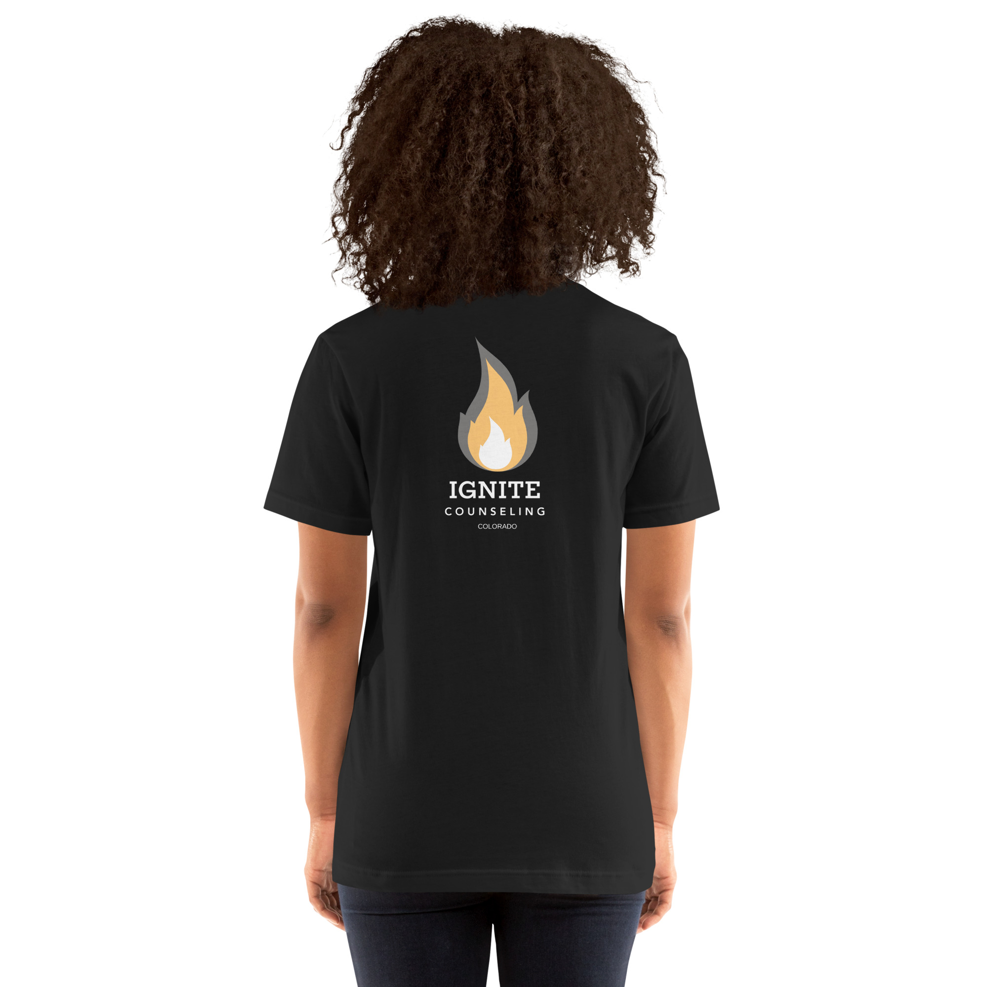 Back view of a black t-shirt featuring the Ignite Counseling Colorado flame logo.